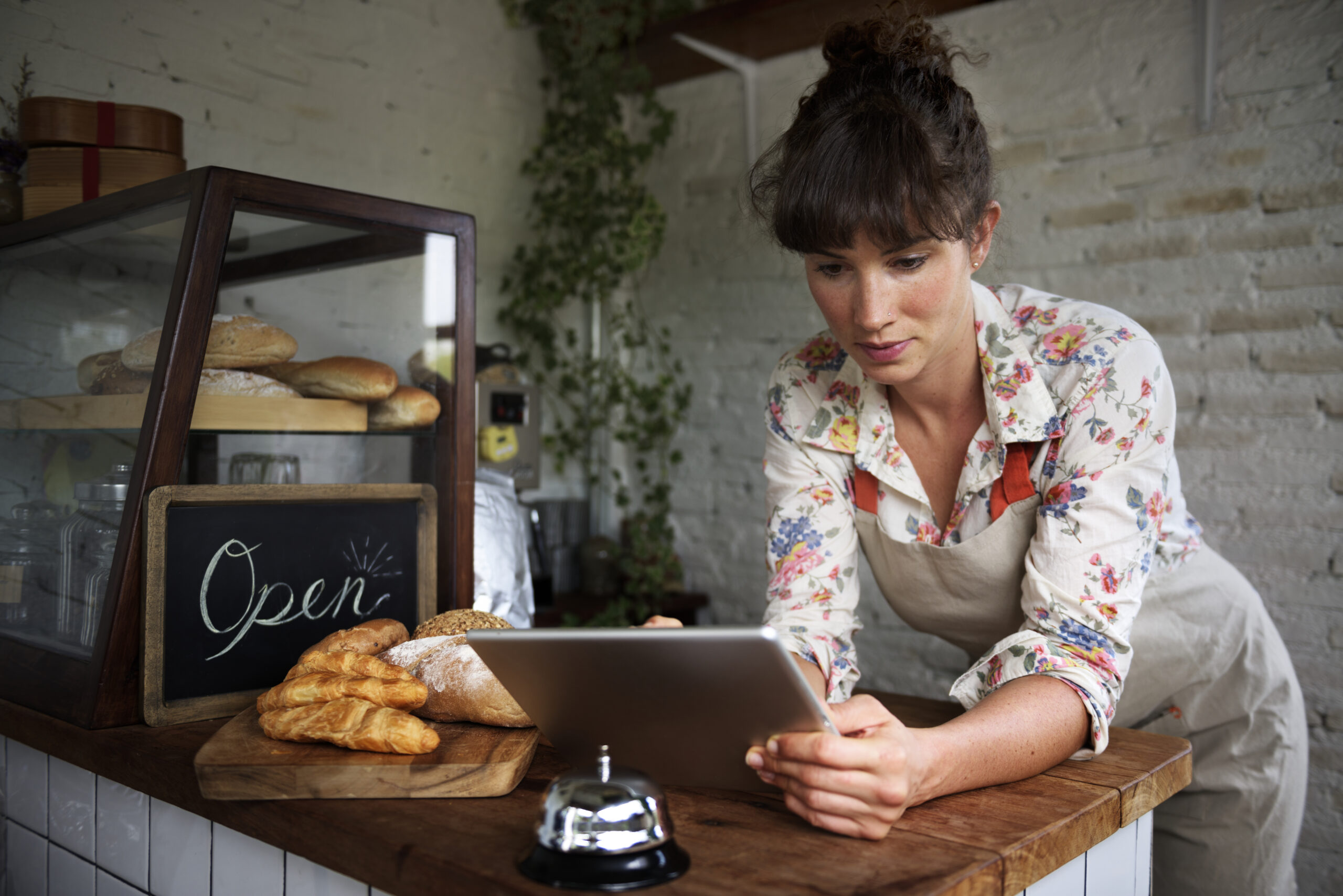 This is just an interpretation of a business owner using tablet to manage their eCommerce Business